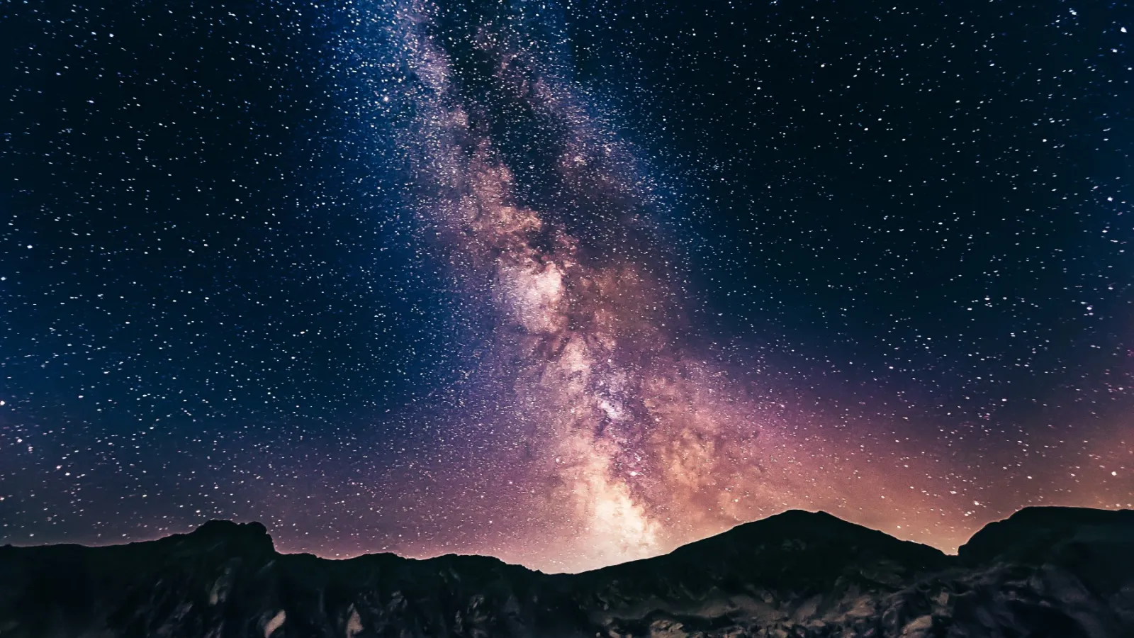 The Milky Way galaxy surrounded by a halo of dust, dark matter and gas