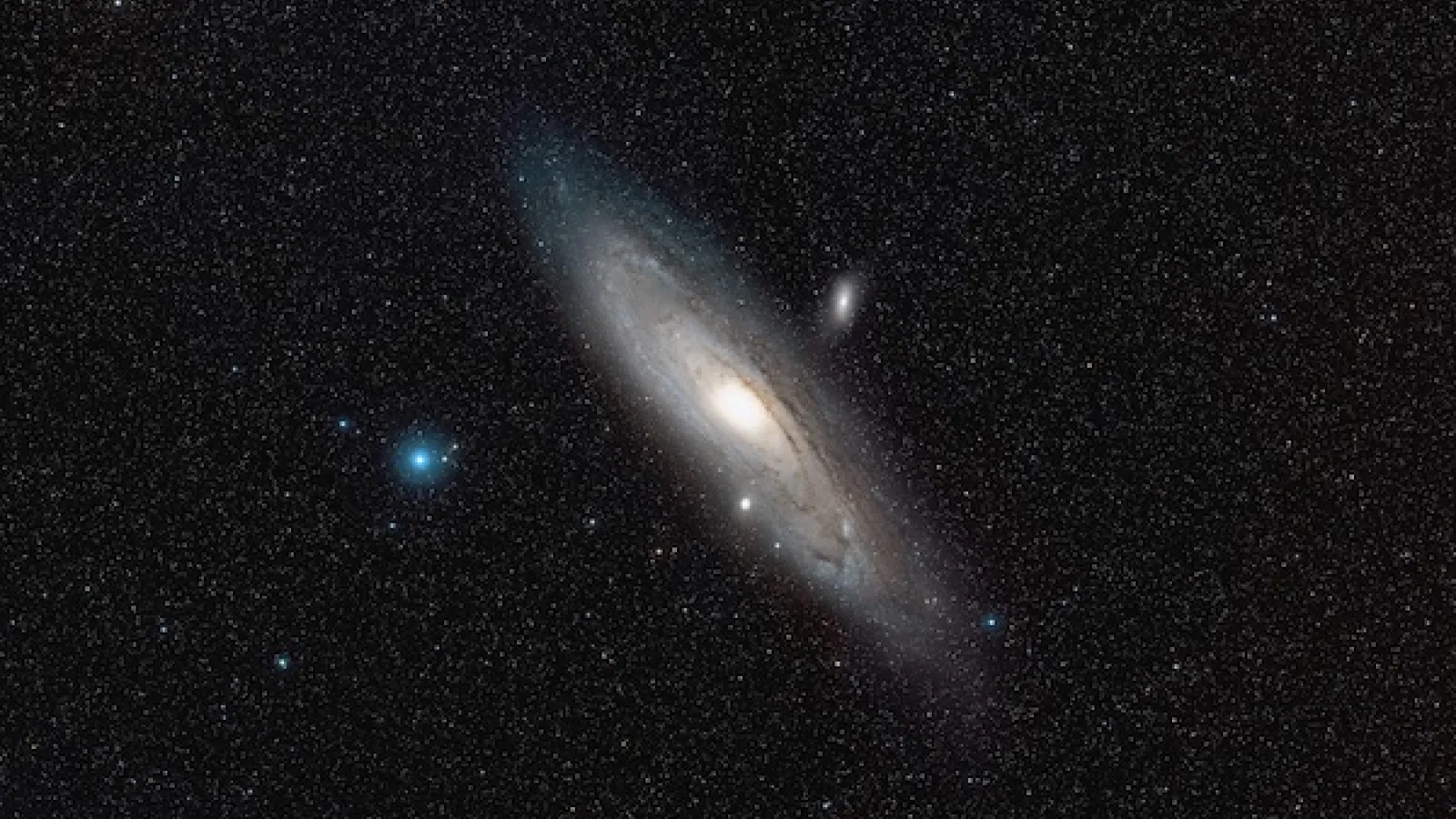 Image of the Andromeda Galaxy floating near the Satellite galaxies M32 and NGC 205 