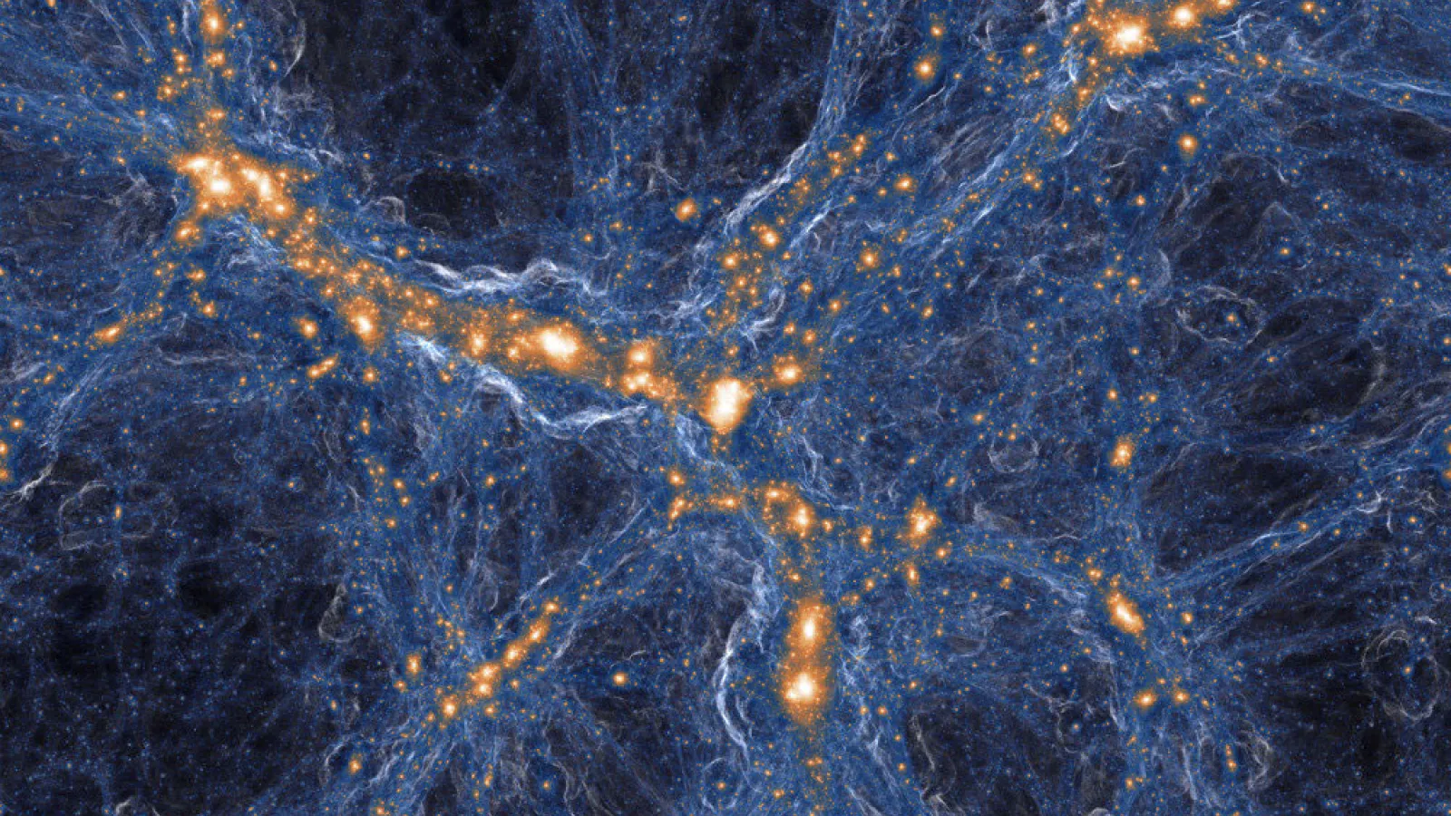 Shown is a projection of the baryonic density field, where image brightness indicates the projected mass density and color hue visualizes the mean projected gas temperature. The displayed region extends by about 1.2 billion lightyears from left to right. The underlying calculation TNG300 shown here is the presently largest magneto-hydrodynamic simulation of galaxy formation, containing more than 30 billion resolution elements. Credit: IllustrisTNG Collaboration