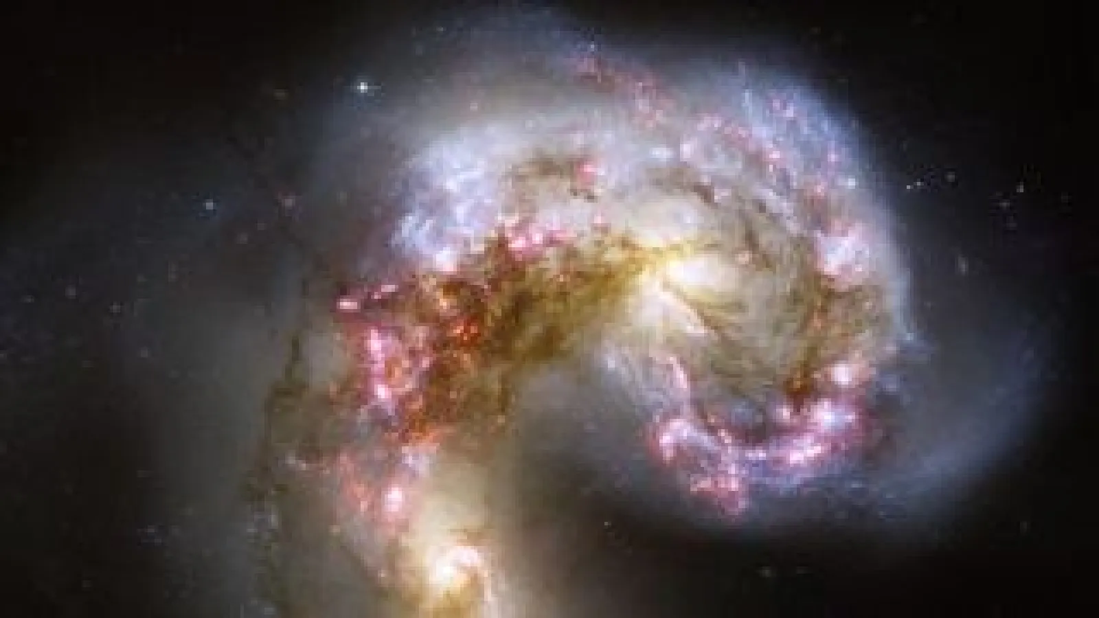 This Hubble image shows two galaxies, NGC4038 and 4039, in the process of merging. (Image credit: NASA, ESA, and the Hubble Heritage Team (STScI/AURA)-ESA/Hubble Collaboration. Acknowledgement: B. Whitmore ( Space Telescope Science Institute) and James Long (ESA/Hubble).)