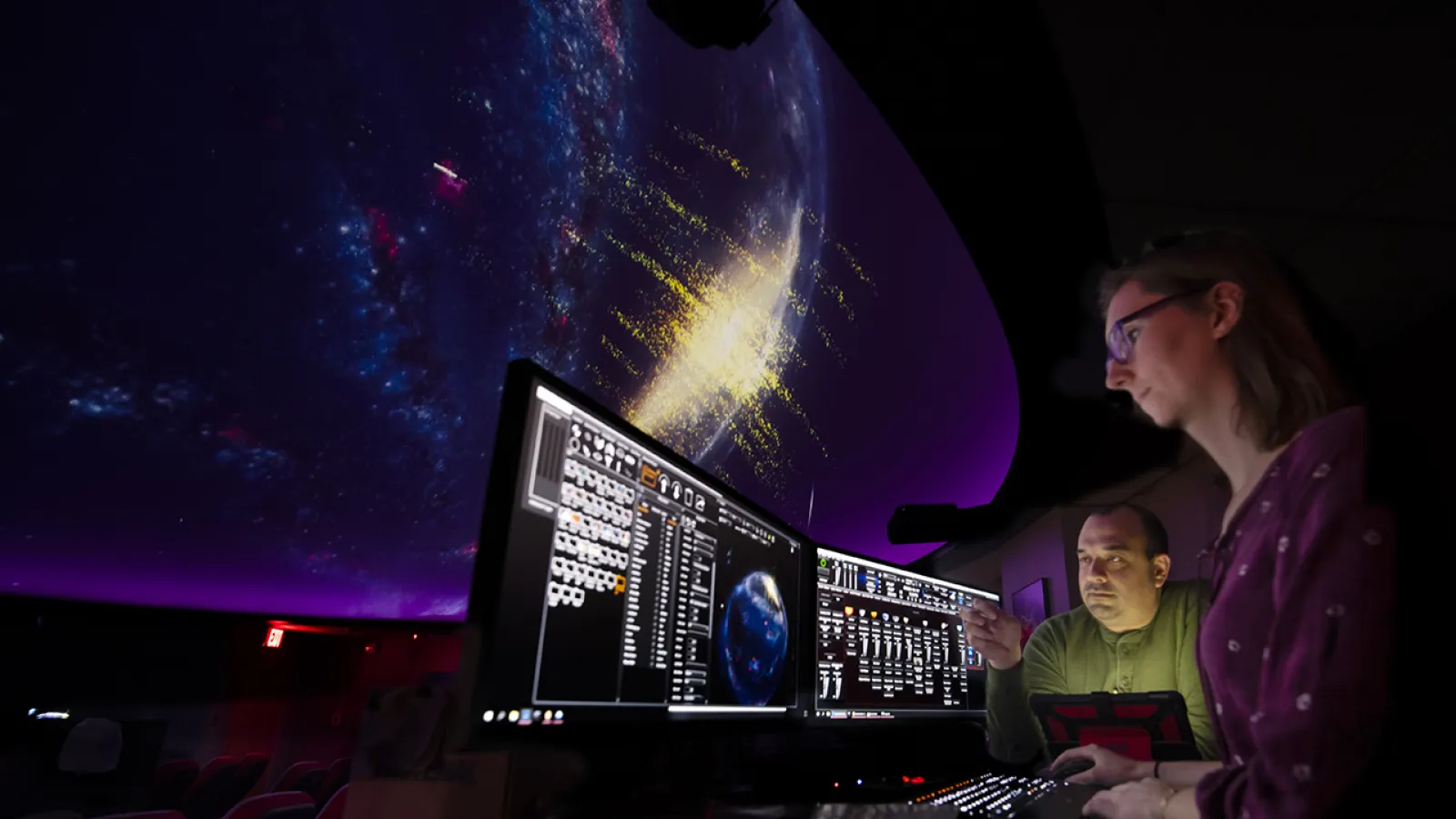 Picture of Wayne Schlingman and Emily Griffith in the OSU planetarium