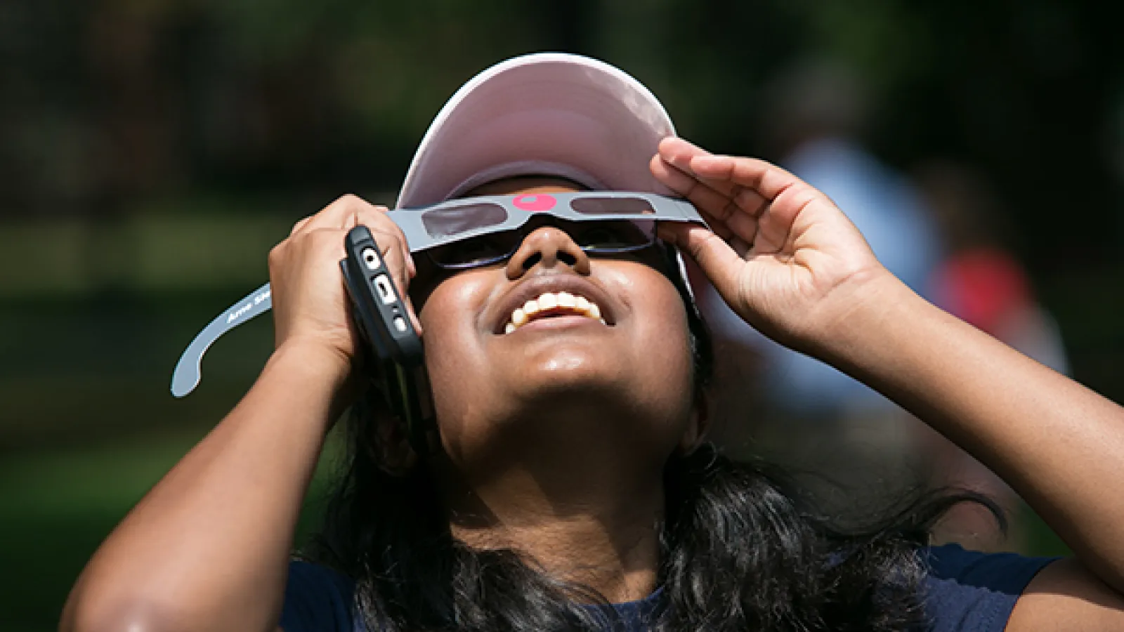 Ohio State student viewing the solar eclipse