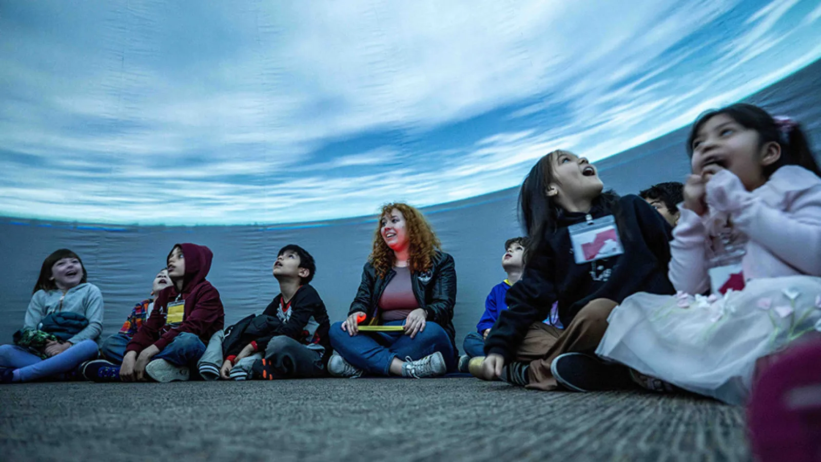 kids in planetarium dome - solstice outreach