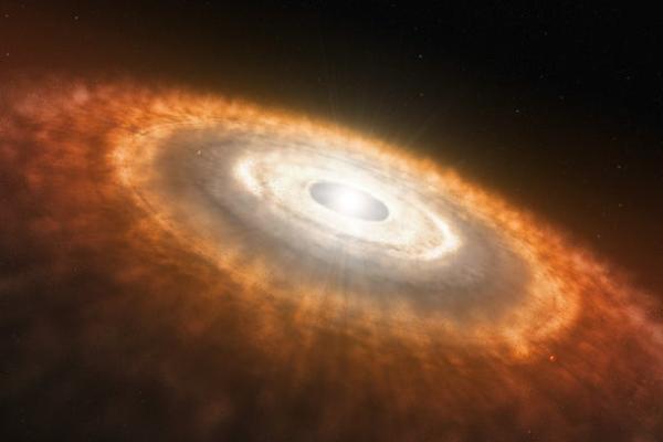 Artist's conception of a disk of gas and dust spiraling around a young star, within which planets are born (ESO/L. Calçada)