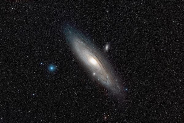 Image of the Andromeda Galaxy floating near the Satellite galaxies M32 and NGC 205 