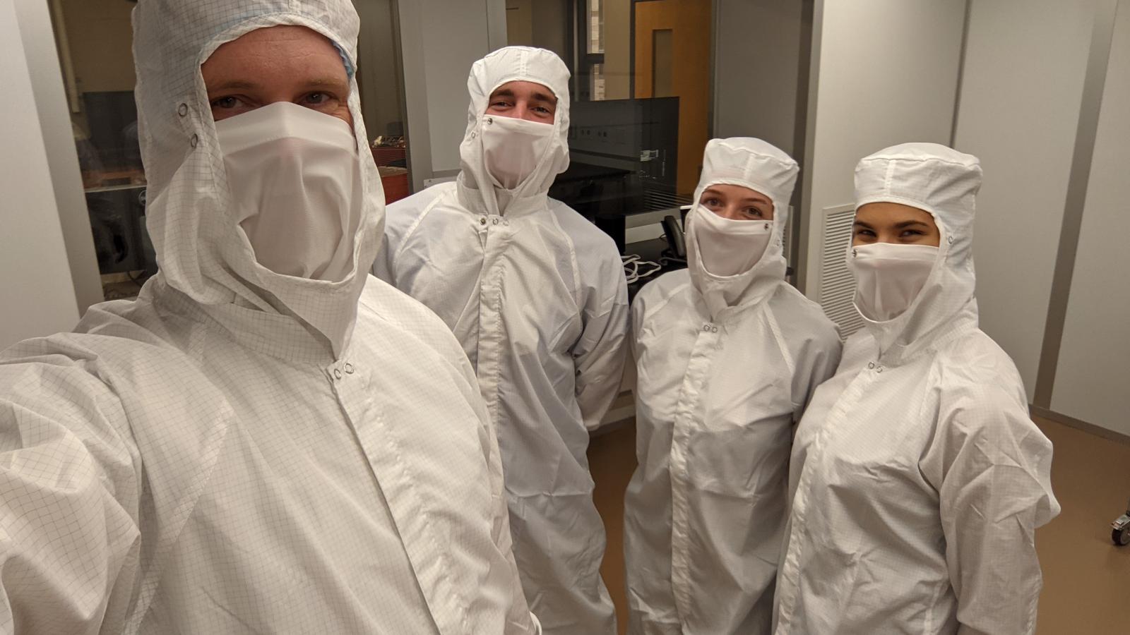 The iLocater team working on instrument development in a cleanroom environment