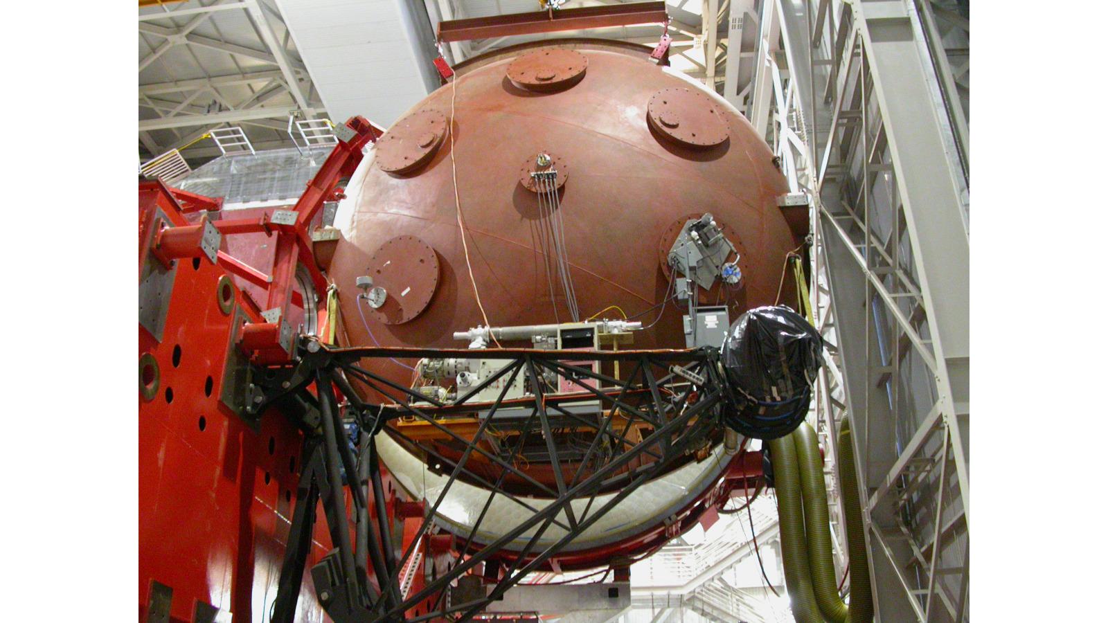 Aluminizing system bell jar in position over the uncoated LBT M1 primary mirror before the first aluminization run